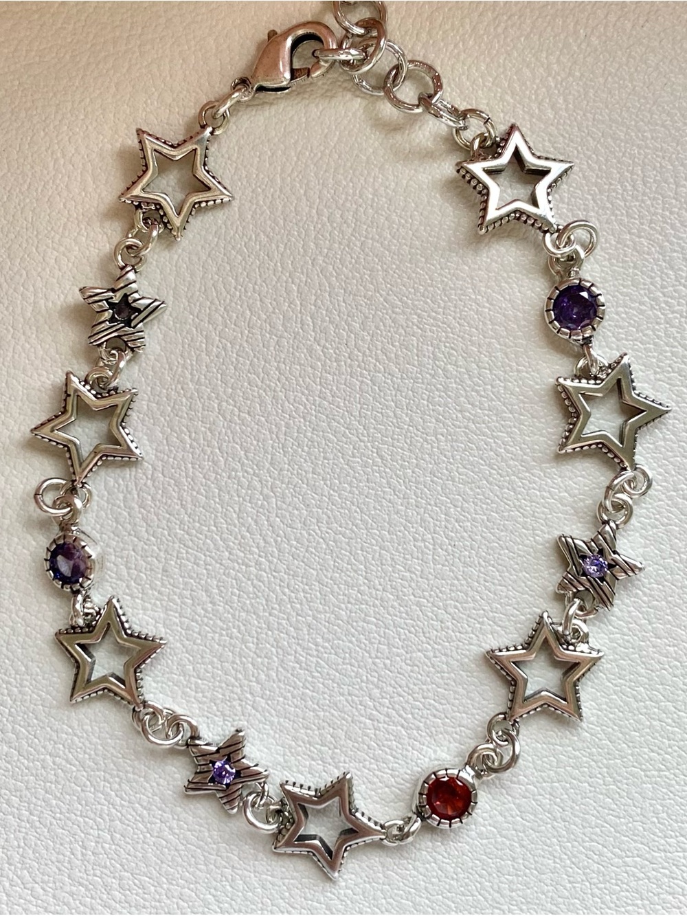 Silver Star Link Bracelet with Purple and Red Gem Accents